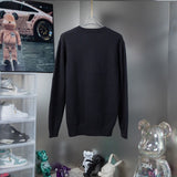 Side profile of Louis Vuitton luxury clothing with signature branding
