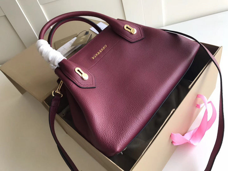 Ziva's Charm handbag – side angle view (one versatile size)