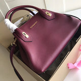 Ziva's Charm handbag – side angle view (one versatile size)