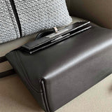 Side view of structured structured handbag