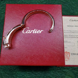 Close-up detail view of Cartier unisex jewelry piece