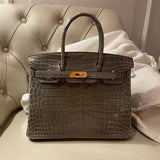 Side view of curated structured handbag