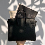 Side view of chic structured handbag