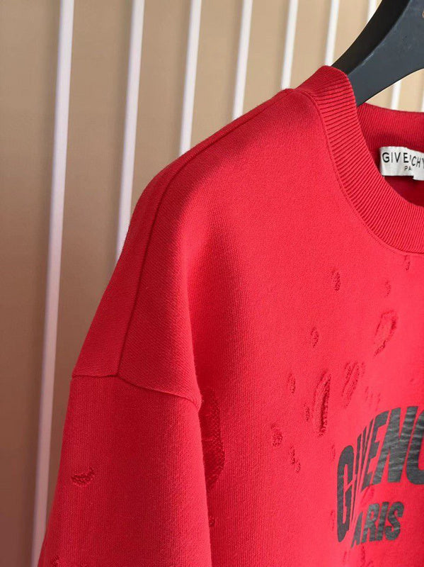 Flat lay presentation of Givenchy luxury clothing with logo-detail design