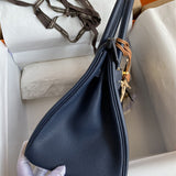 Side view of minimalist structured handbag