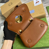 Styled lifestyle shot of elevated modern women's handbag – women's luxury accessory