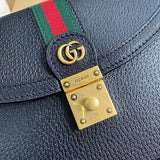 Styled lifestyle shot of structured everyday-luxe women's handbag – women's designer-style accessory