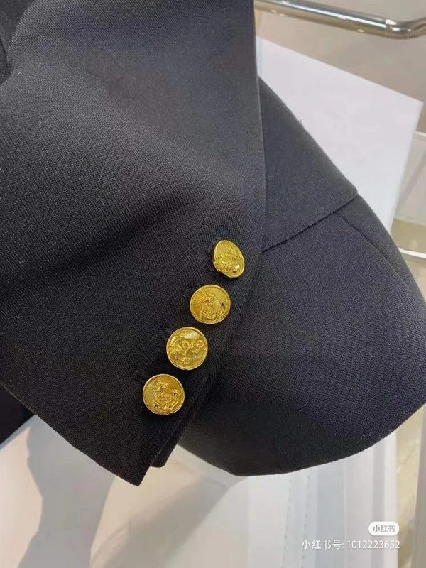 Side profile of Louis Vuitton luxury clothing with logo-detail design