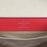 Side profile of polished refined women's handbag – women's statement bag