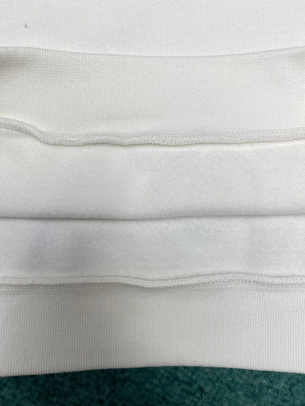 Close-up detail shot of Louis Vuitton luxury clothing with everyday silhouette