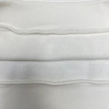 Close-up detail shot of Louis Vuitton luxury clothing with everyday silhouette