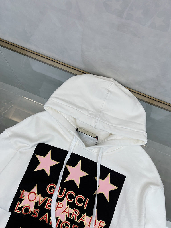 Close-up detail shot of Gucci luxury clothing with logo-detail design