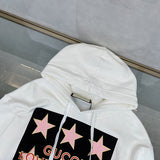 Close-up detail shot of Gucci luxury clothing with logo-detail design