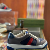 Gucci soft grey luxury sneakers view 5 classic court silhouette