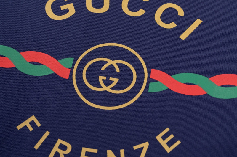 Flat lay presentation of Gucci luxury clothing with tailored silhouette