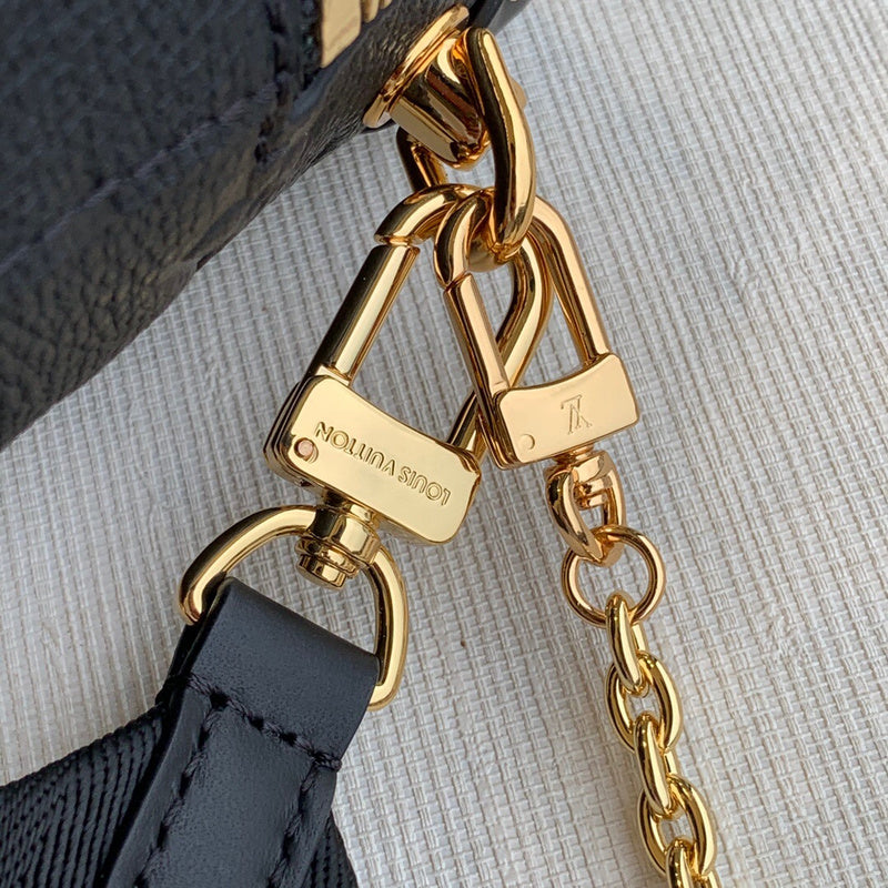 Handle and strap detail of elevated classic women's handbag – women's statement bag