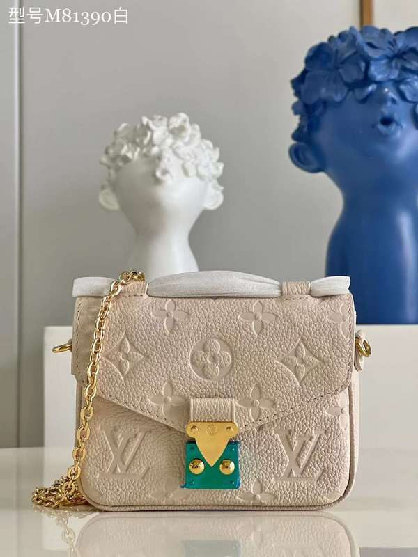 Front view of structured signature women's handbag – women's statement bag