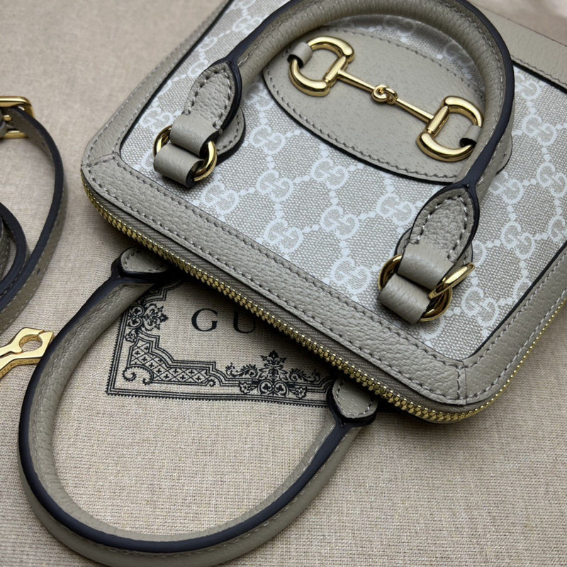 Handle and strap detail of everyday-luxe premium women's handbag – women's luxury accessory