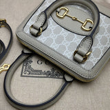 Handle and strap detail of everyday-luxe premium women's handbag – women's luxury accessory
