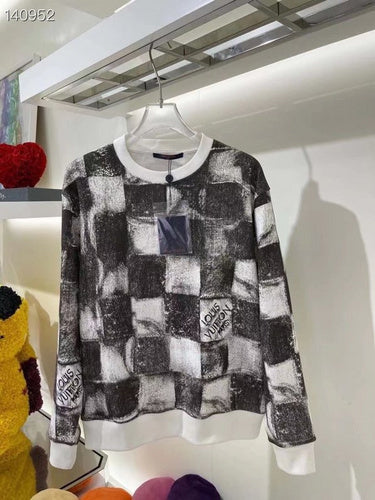 Front view of Louis Vuitton luxury clothing with streetwear-inspired cut