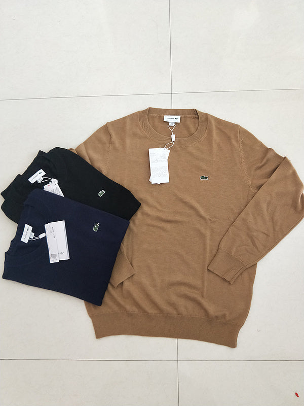 Side profile of Lacoste luxury clothing with monogram-inspired silhouette
