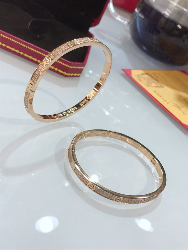 Front view of Cartier unisex jewelry piece