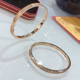 Front view of Cartier unisex jewelry piece