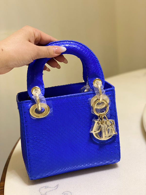 Styled lifestyle shot of polished sleek women's handbag – women's premium purse