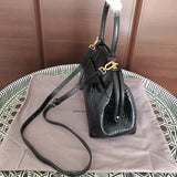 Handle and strap detail of modern chic women's handbag – women's designer-style accessory