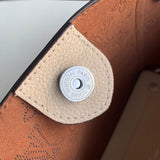 Styled lifestyle shot of structured sleek women's handbag – women's statement bag
