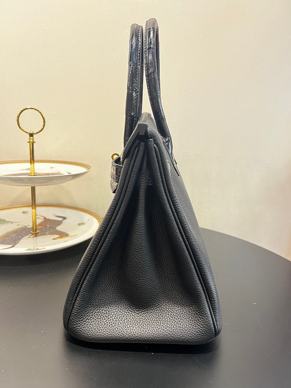 Side view of effortless structured handbag