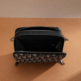 Styled lifestyle shot of signature statement women's handbag – women's premium purse