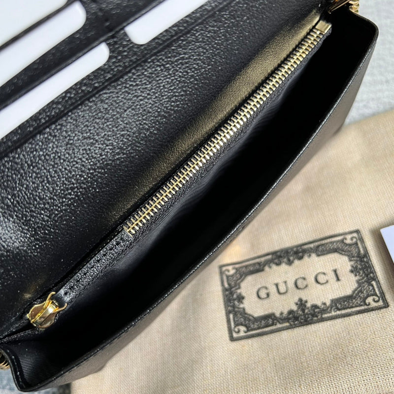 Side profile of polished elevated women's handbag – women's designer-style accessory