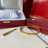 Side view of Cartier unisex jewelry piece