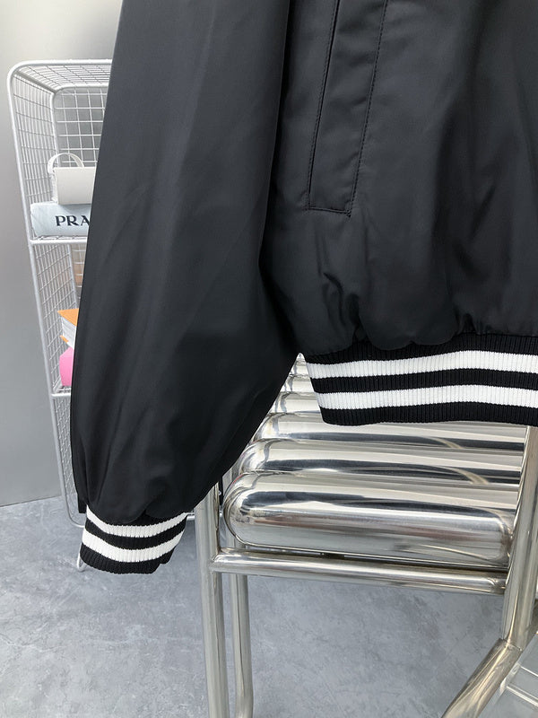 Back view of Louis Vuitton luxury clothing with label-forward styling
