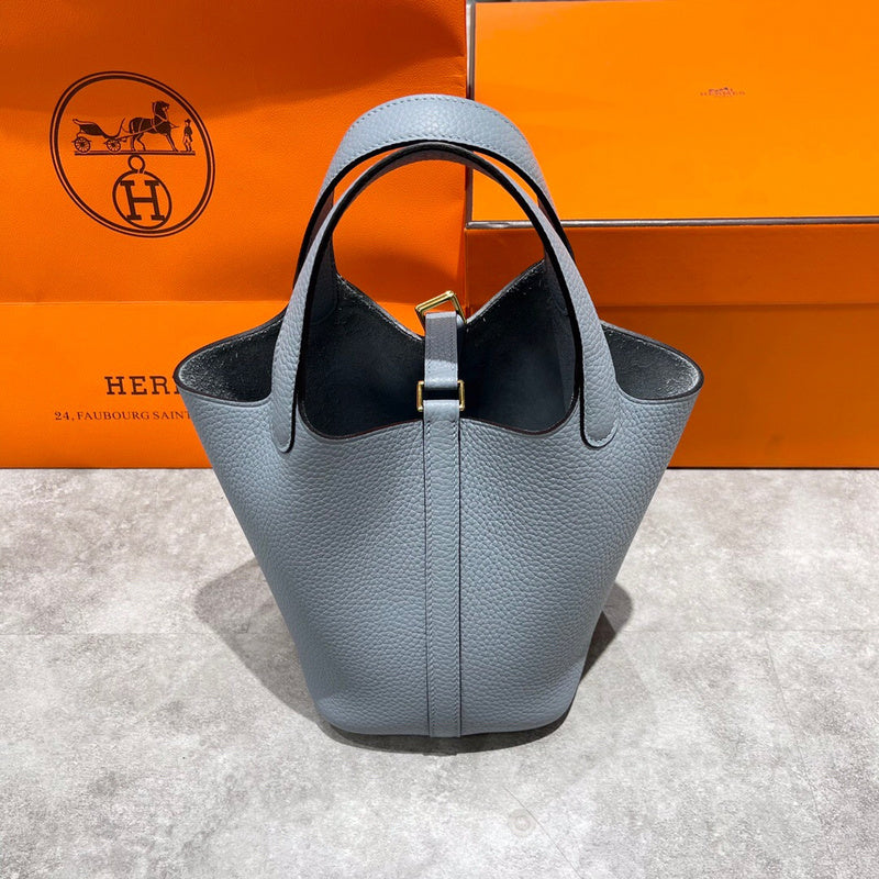Side view of streamlined structured handbag