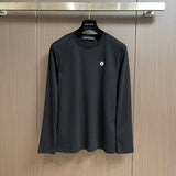 Front view of Louis Vuitton luxury clothing with tailored silhouette