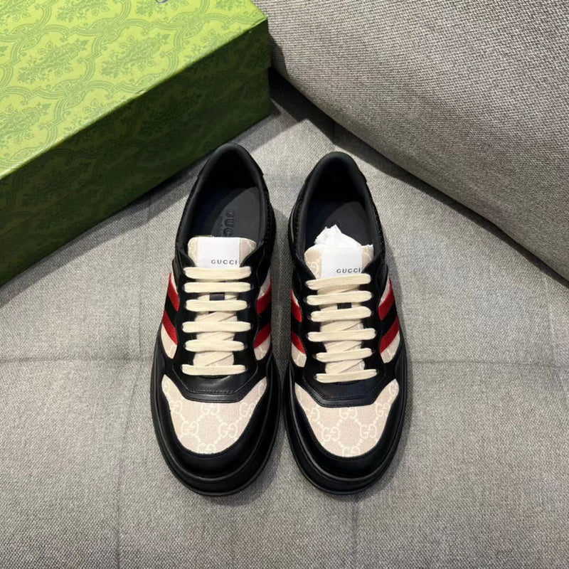 Side profile of Gucci two-tone sneakers sleek tonal finish