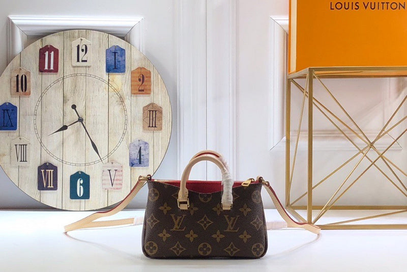 Front view of polished elevated women's handbag – women's designer-style accessory