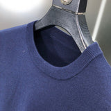 Full styled look of Louis Vuitton luxury clothing with tailored silhouette