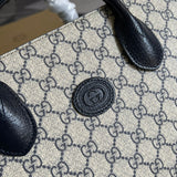 Styled lifestyle shot of refined structured women's handbag – women's luxury handbag