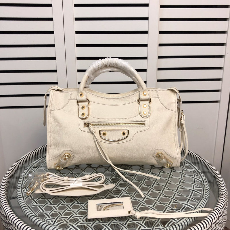 Side profile of polished premium women's handbag – women's statement bag