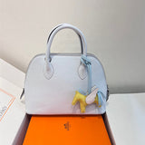  minimalist handbag detail view showing craftsmanship