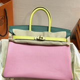 Side view of curated structured handbag