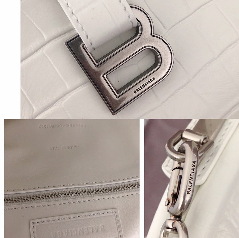 Front view of elevated modern women's handbag – women's statement bag