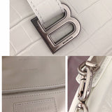 Front view of elevated modern women's handbag – women's statement bag
