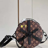 Side profile of classic sleek women's handbag – women's statement bag