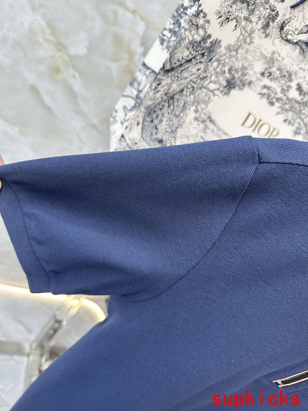 Close-up detail shot of Moncler luxury clothing with tailored silhouette