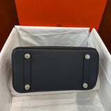 Statement handbag styled for everyday wear