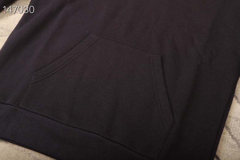 Close-up detail shot of Louis Vuitton luxury clothing with tailored silhouette